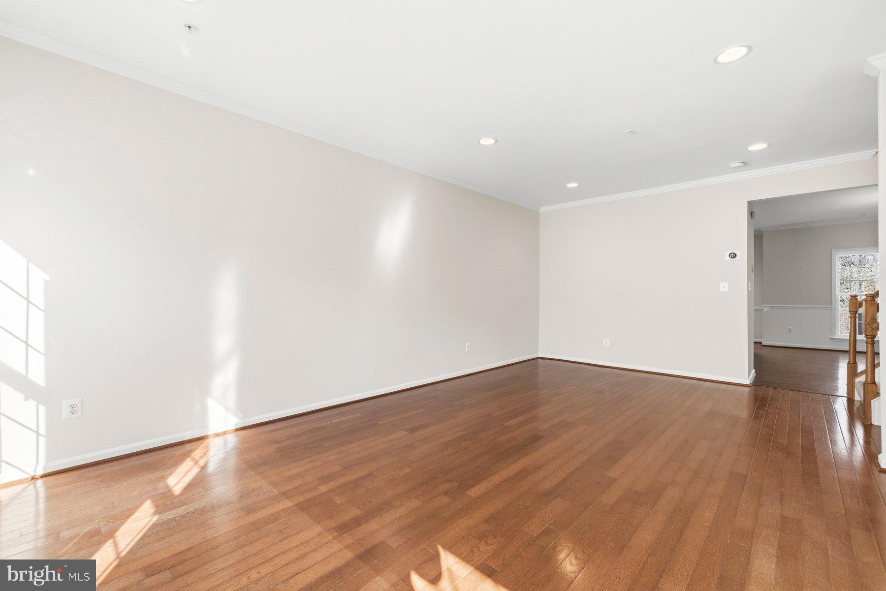 2640 Streamview Drive Odenton, MD 21113 - Photo 7 of 73 a view of empty room with wooden floor and fan