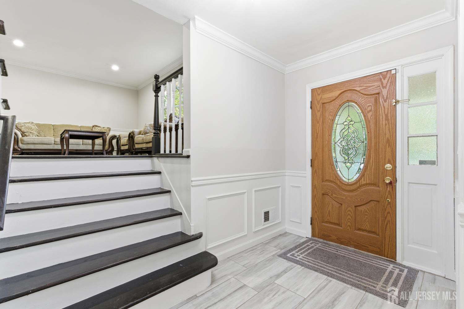 5 McKinley Street Edison, NJ 08820 - Photo 4 of 38 a view of entryway with wooden floor