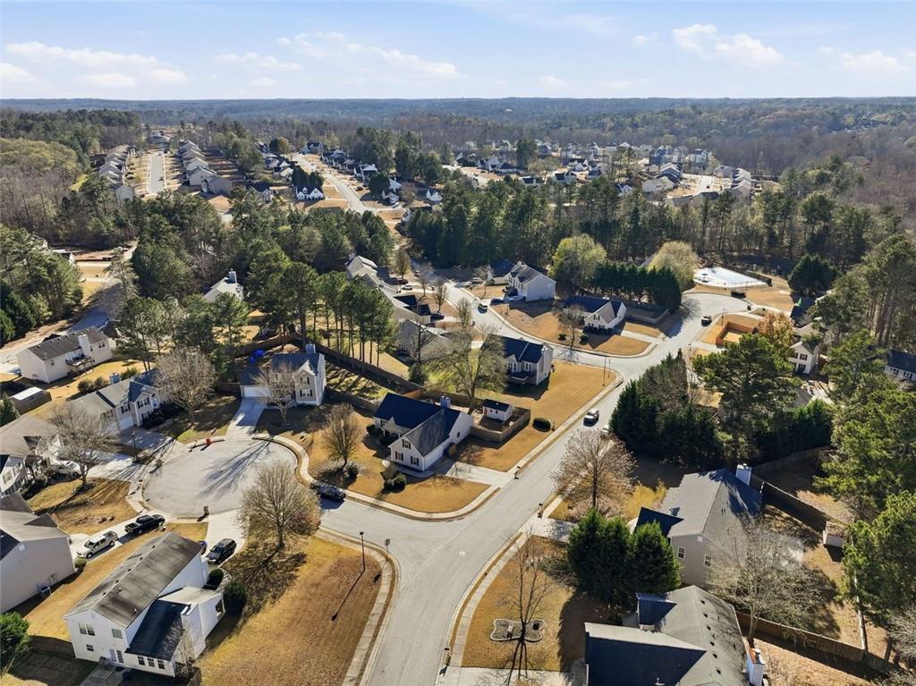 921 Roxeywood Drive Winder, GA 30680 - Photo 7 of 56 an aerial view of a city with lots of residential buildings