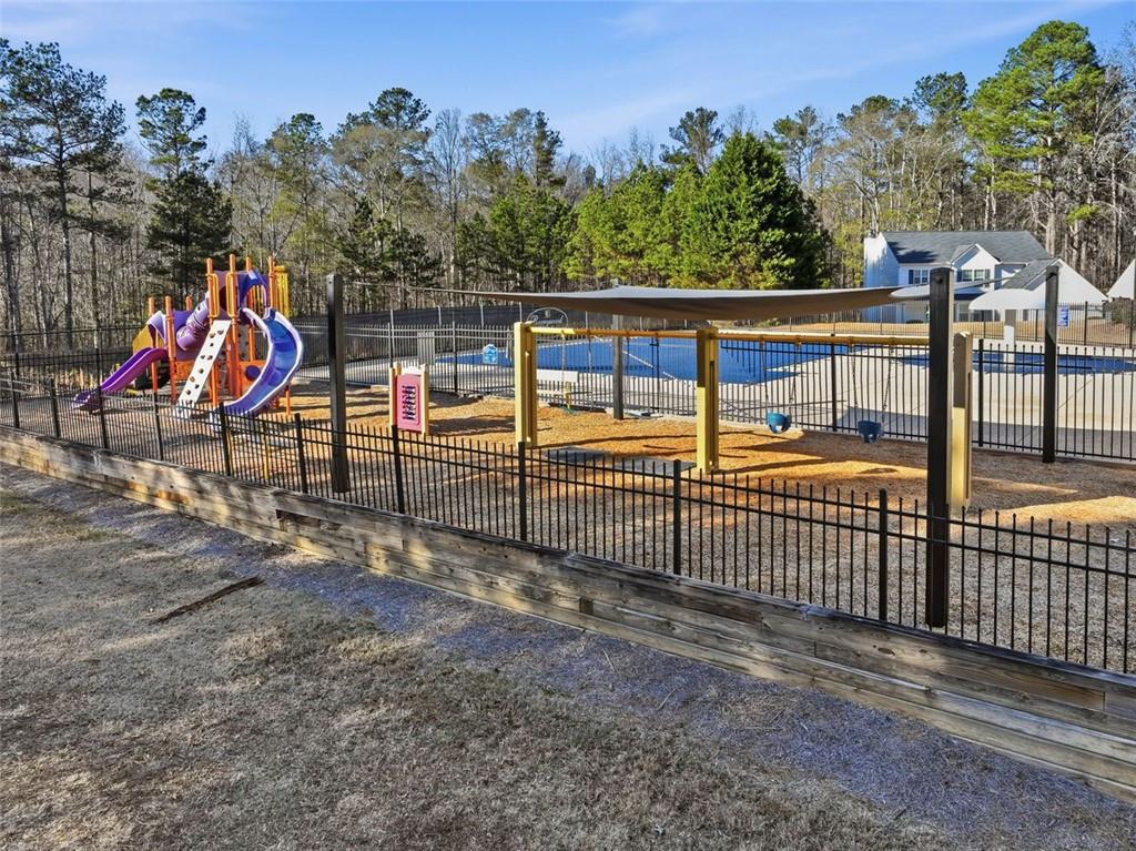 921 Roxeywood Drive Winder, GA 30680 - Photo 10 of 56 a view of a wrought iron fences in front of house