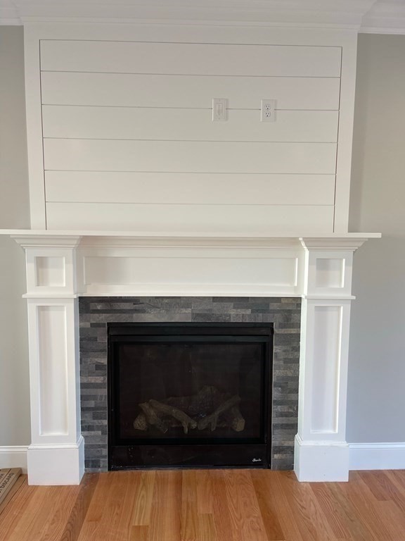 27 Paugus Trail Groton, MA 01450 - Photo 14 of 29 a living room with a fireplace