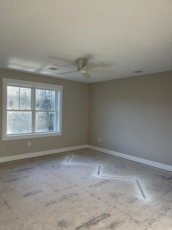 27 Paugus Trail Groton, MA 01450 - Photo 17 of 29 an empty room with a window