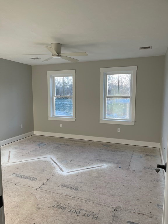27 Paugus Trail Groton, MA 01450 - Photo 21 of 29 an empty room with windows