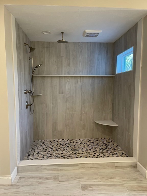 27 Paugus Trail Groton, MA 01450 - Photo 23 of 29 a bathroom with a shower