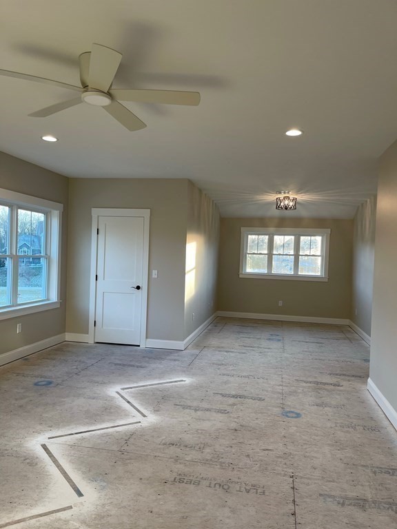 27 Paugus Trail Groton, MA 01450 - Photo 27 of 29 a view of an empty room and a window