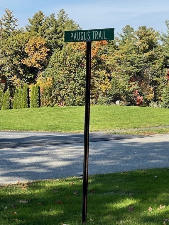 27 Paugus Trail Groton, MA 01450 - Photo 29 of 29 a view of a field with a tree in front of the house
