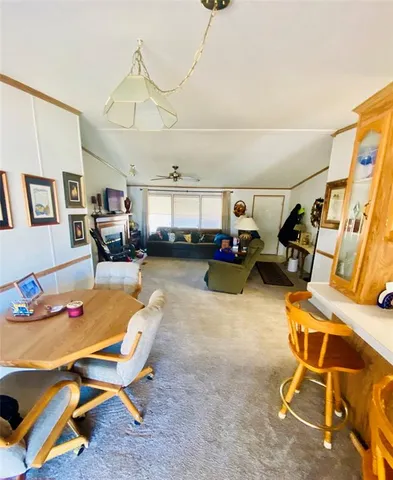 a workspace with furniture and a window