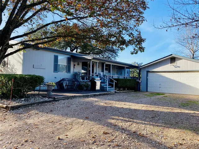 a front view of a house with patio