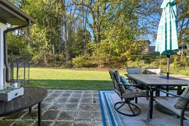 a view of yard with outdoor seating