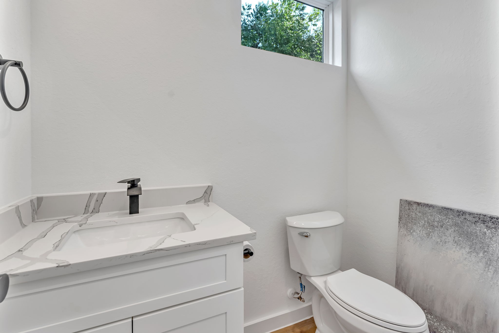 3620 Sauer Street, Unit B Houston, TX 77004 - Photo 13 of 31 a bathroom with a sink vanity mirror and toilet