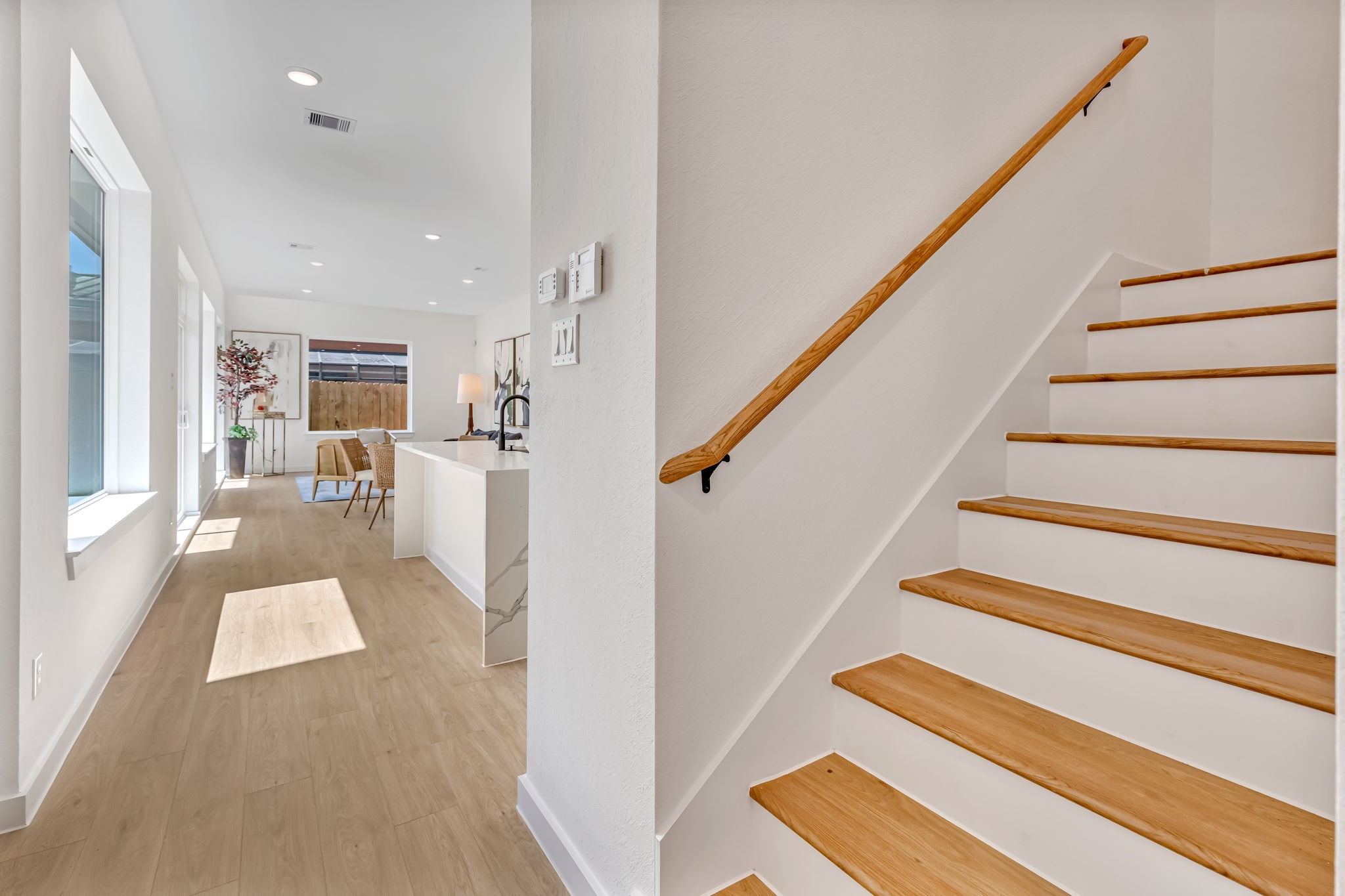 3620 Sauer Street, Unit B Houston, TX 77004 - Photo 14 of 31 a view of entryway and hall with wooden floor