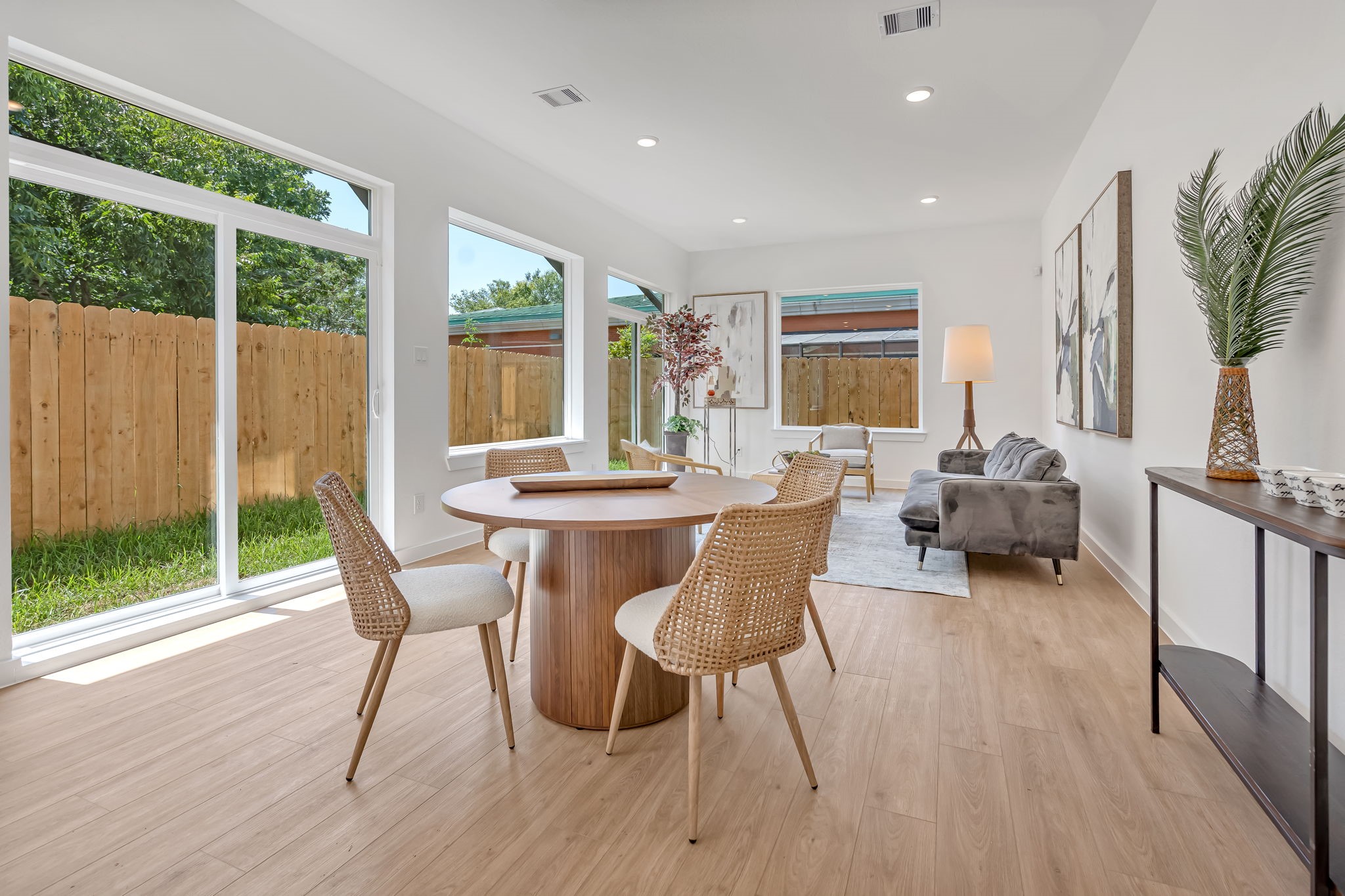 3620 Sauer Street, Unit B Houston, TX 77004 - Photo 2 of 31 a view of a dining room with furniture and wooden floor