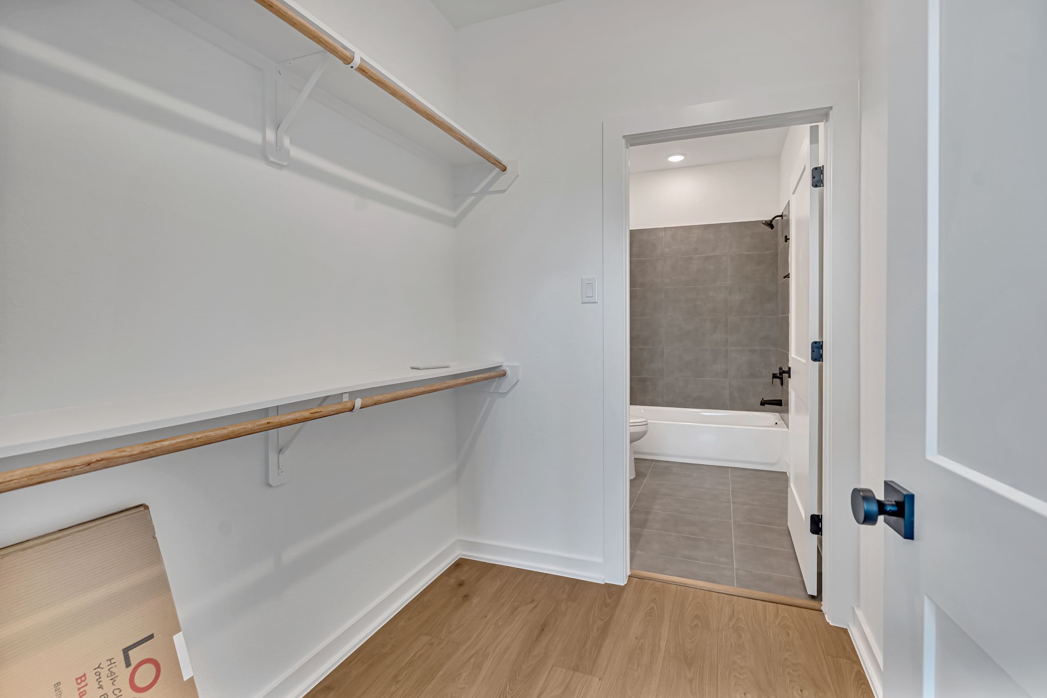 3620 Sauer Street, Unit B Houston, TX 77004 - Photo 26 of 31 a view of walk in closet with wooden floor