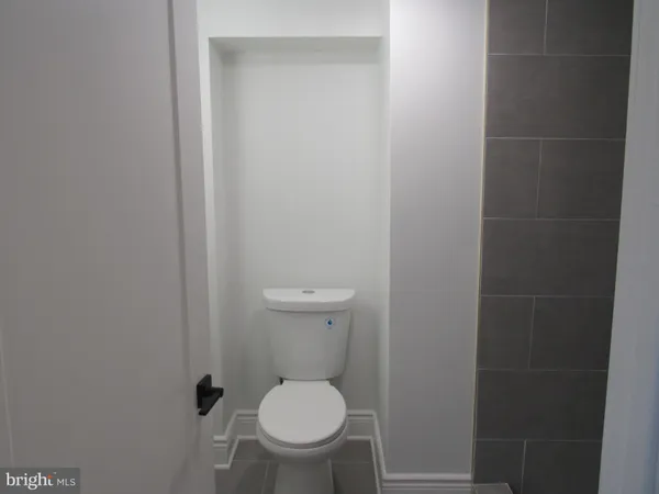 a bathroom with a toilet