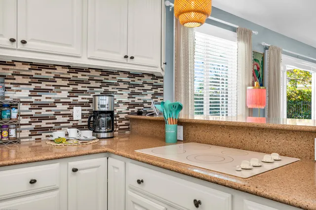 a bedroom with a bed and a fireplace