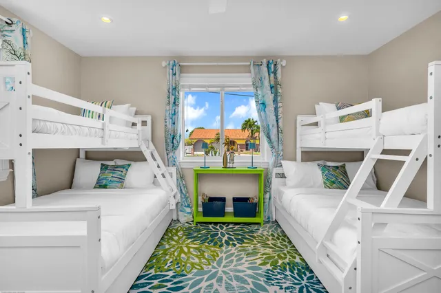 a bedroom with furniture and a bed