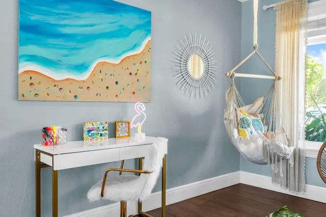 a view of a house with a yard porch and sitting area