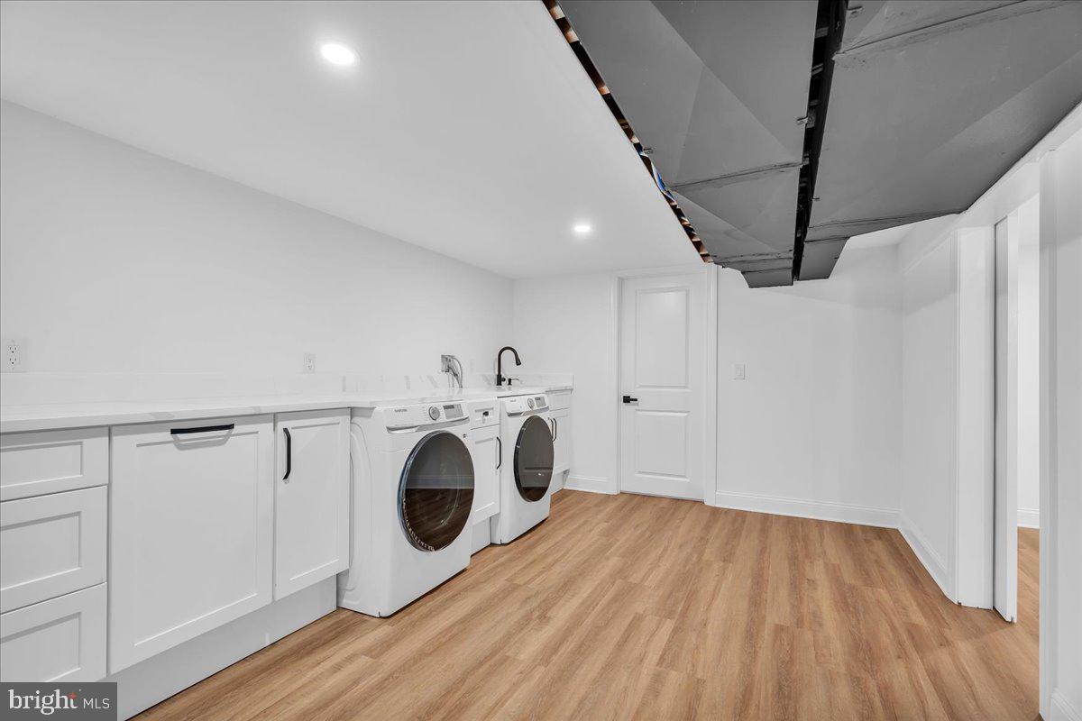 2504 Church Road Cinnaminson, NJ 08077 - Photo 52 of 79 a view of storage and utility room with washer and dryer