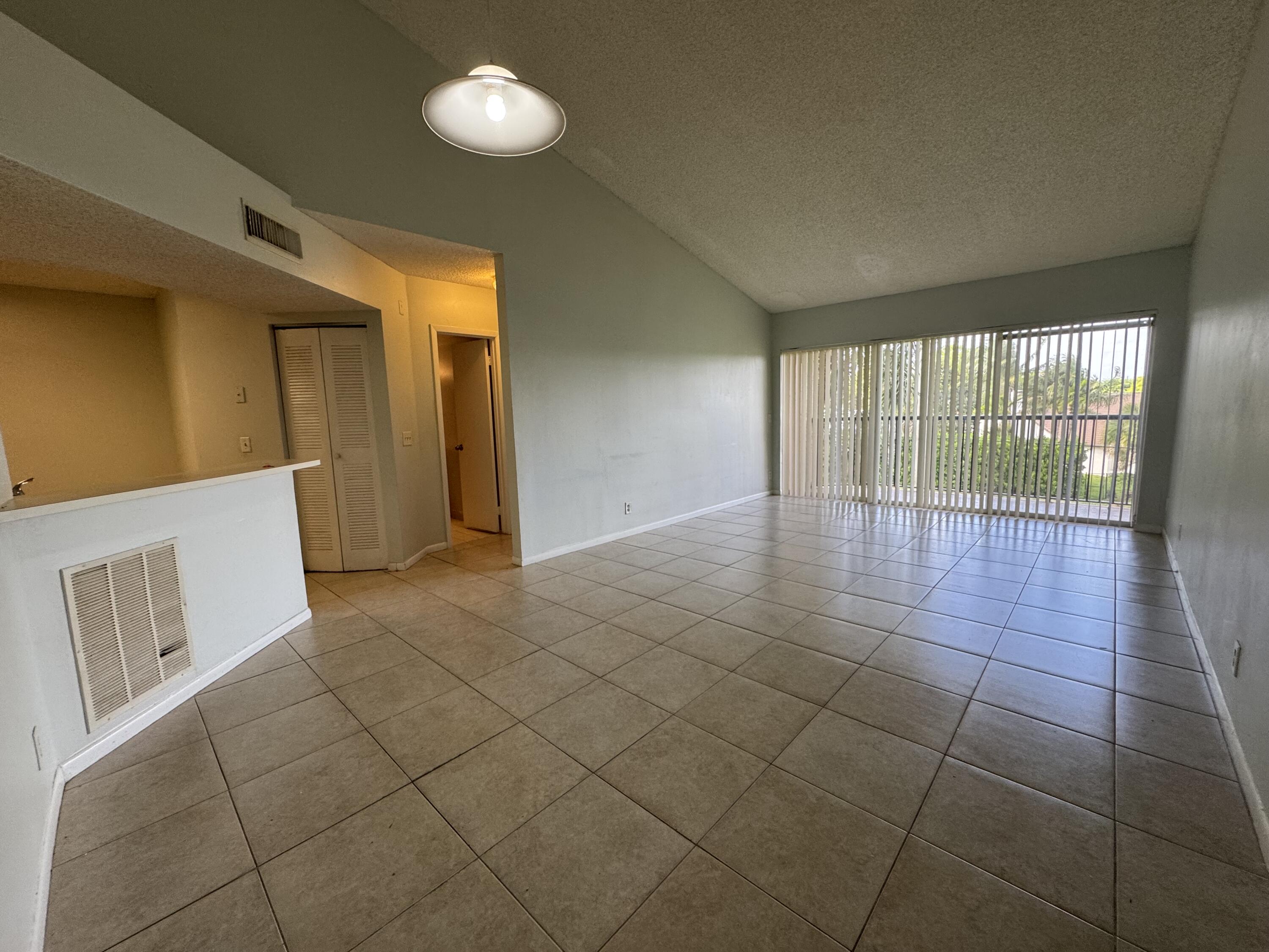 8891 Wiles Road, Unit 303 Coral Springs, FL 33067 - Photo 2 of 10 IMG_2998