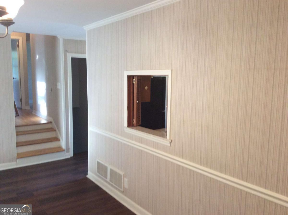 209 Decatur Road McDonough, GA 30253 - Photo 17 of 33 a view of an entryway with wooden floor