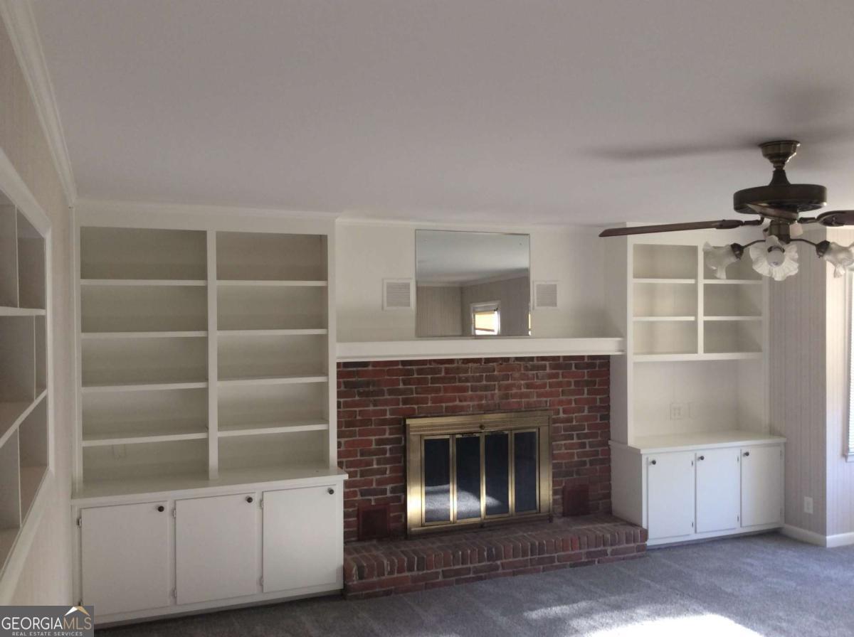 209 Decatur Road McDonough, GA 30253 - Photo 19 of 33 a living room with a fireplace