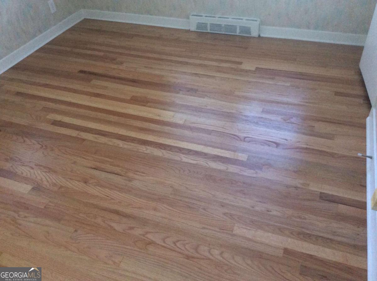 209 Decatur Road McDonough, GA 30253 - Photo 25 of 33 a view of hallway with wooden floor