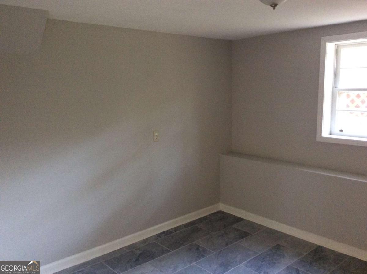 209 Decatur Road McDonough, GA 30253 - Photo 32 of 33 a room that has a window