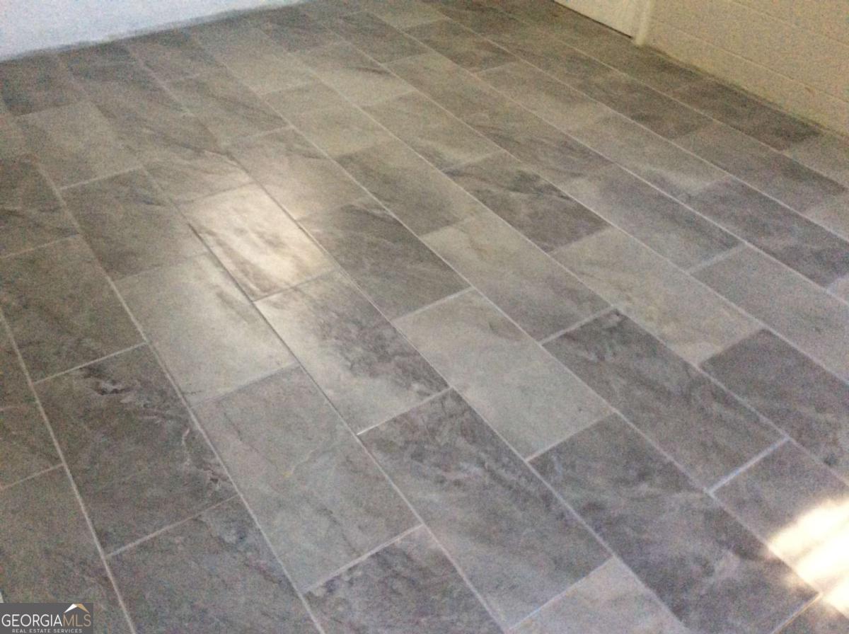 209 Decatur Road McDonough, GA 30253 - Photo 33 of 33 a bathroom with a shower