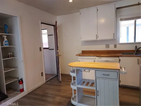 a bathroom with a toilet and a sink