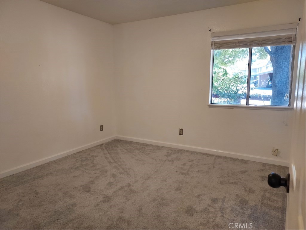 6135 Ridgeview Drive Clearlake, CA 95422 - Photo 23 of 36 an empty room with a window