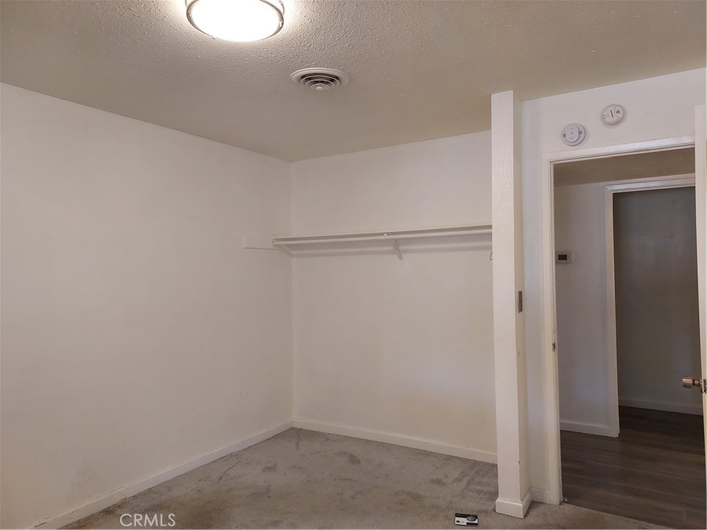 6135 Ridgeview Drive Clearlake, CA 95422 - Photo 24 of 36 a view of small space with wooden floor
