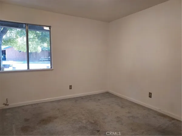 a close view of laundry room with washer and dryer