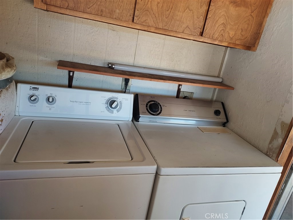 6135 Ridgeview Drive Clearlake, CA 95422 - Photo 27 of 36 a close view of laundry room with washer and dryer