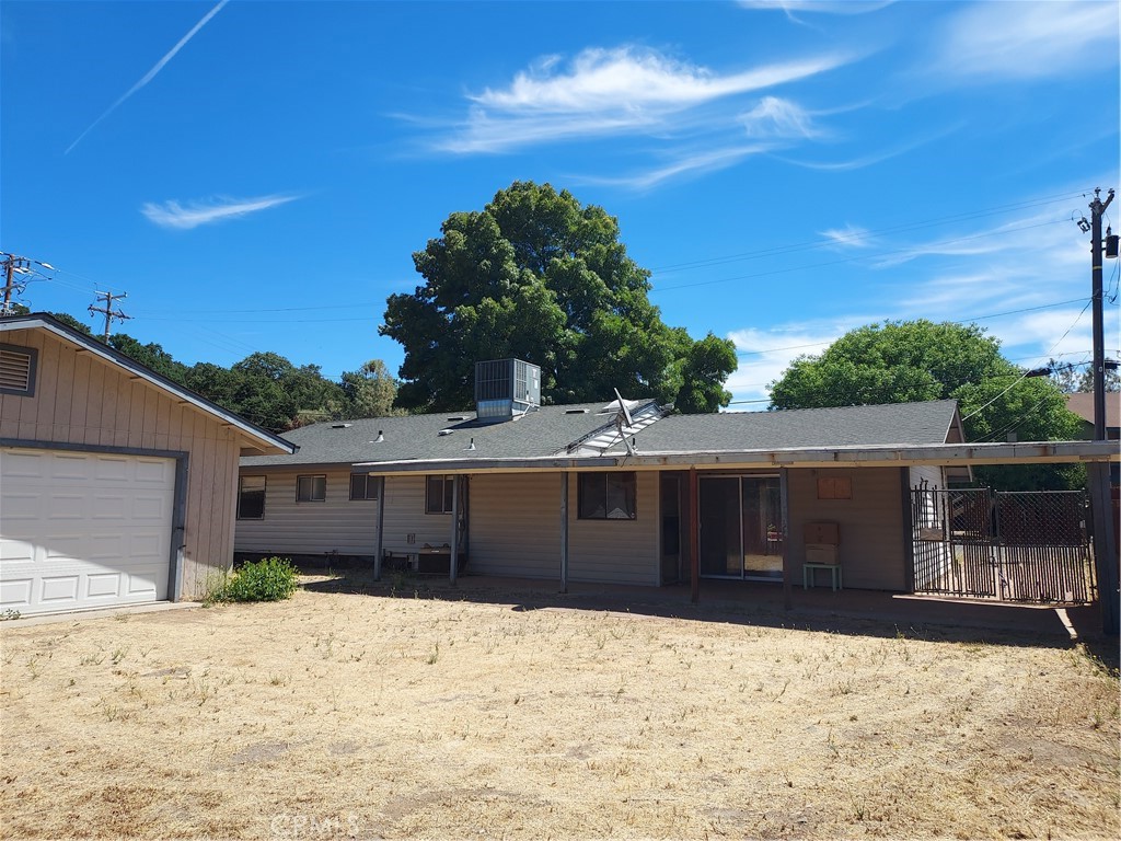 6135 Ridgeview Drive Clearlake, CA 95422 - Photo 35 of 36 a house with a yard