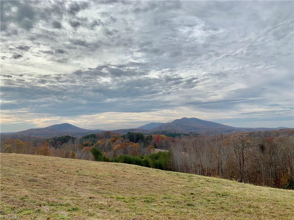 0 Mission Road Danbury, NC 27016 - Photo 15 of 27 View of neighboring mountains standing on gravel driveway/Access #1 looking west.