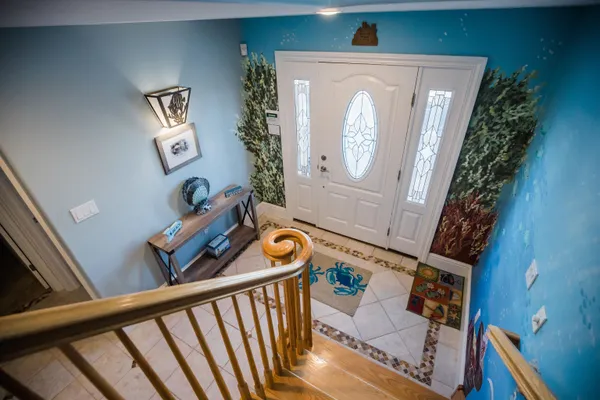 a bedroom with bed and a window