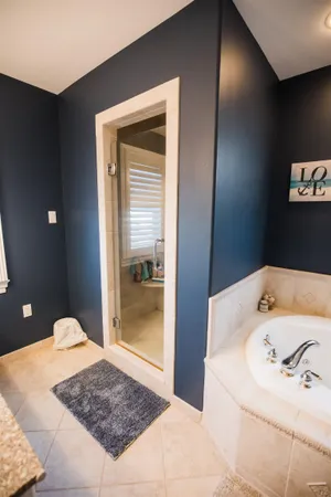 a bathroom with a toilet and a sink