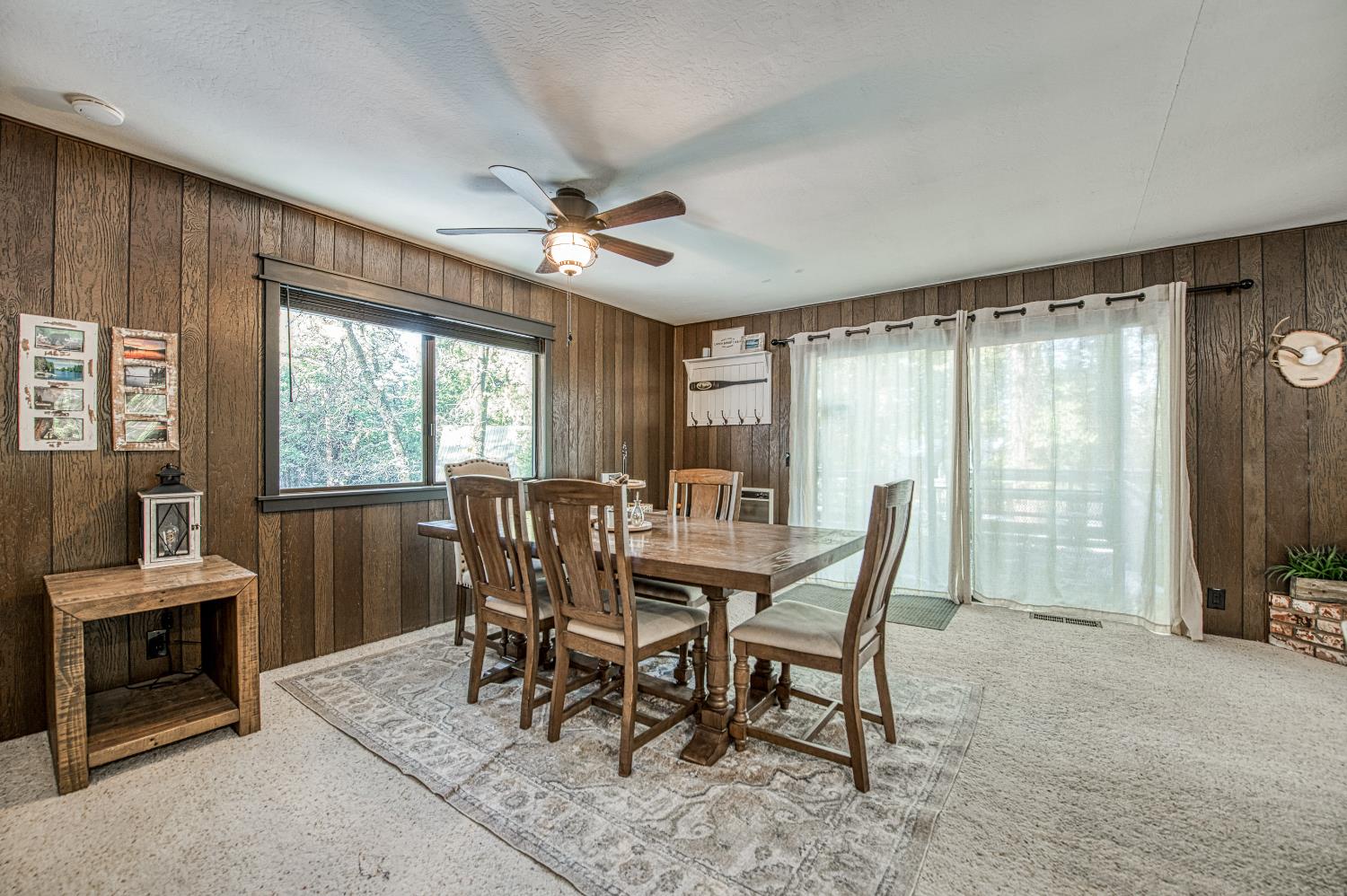 42488 Rock Ledge Road Shaver Lake, CA 93664 - Photo 12 of 37 a view of a dining room with furniture window and outside view
