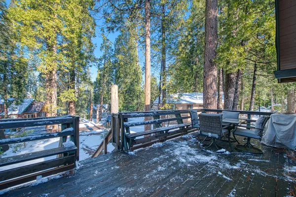 a view of a bench in a backyard