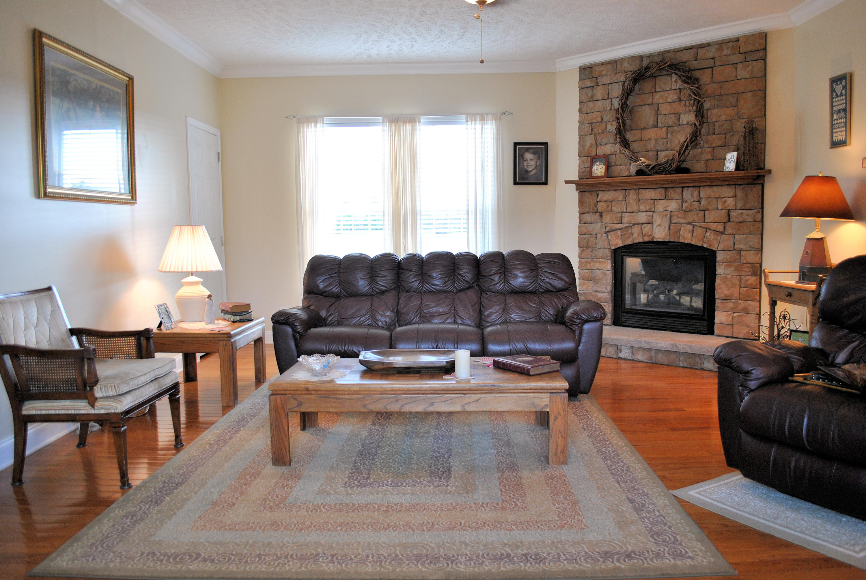 785 Union Valley Road Riner, VA 24149 - Photo 23 of 86 a living room with furniture and a fireplace
