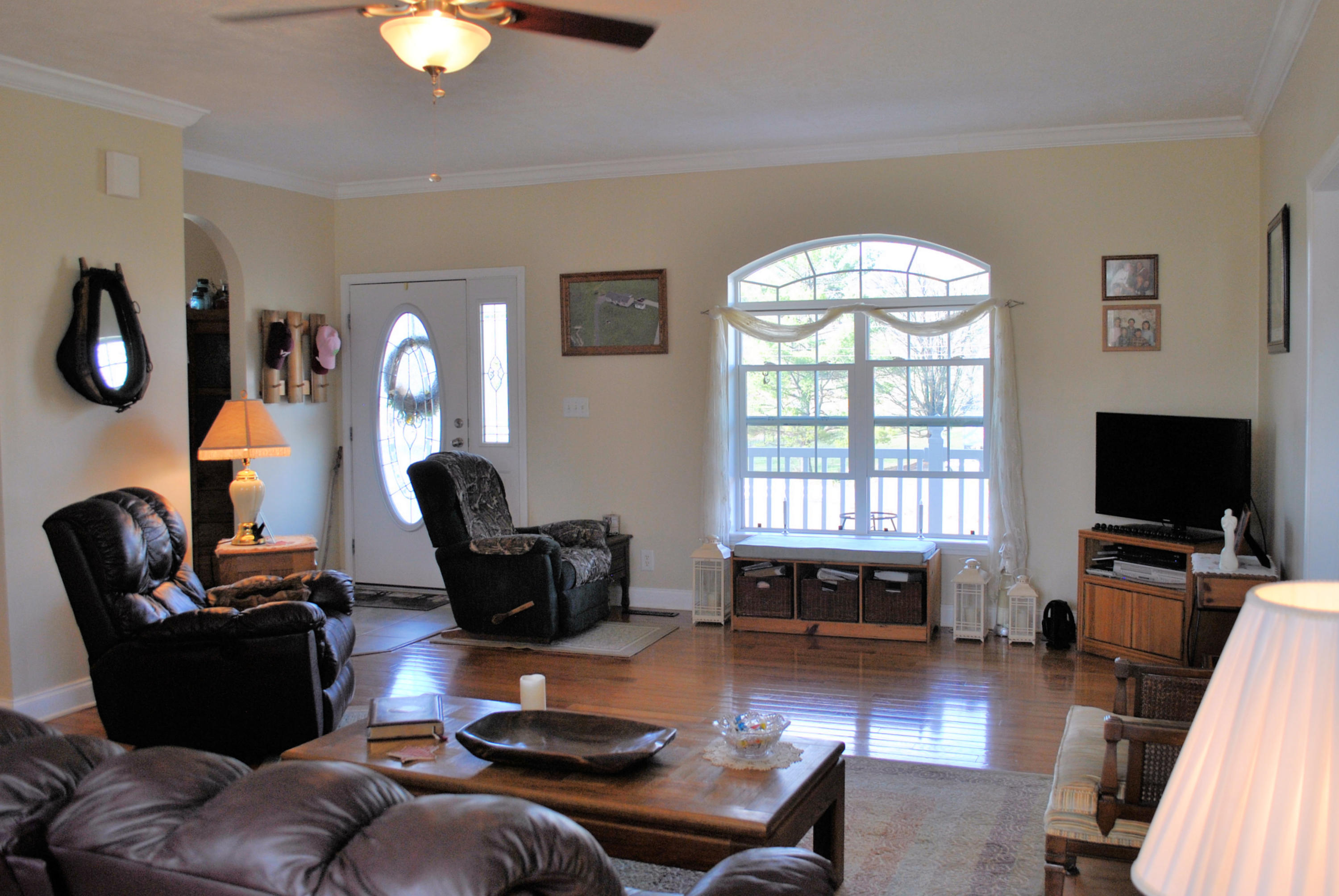 785 Union Valley Road Riner, VA 24149 - Photo 25 of 86 a living room with furniture and a flat screen tv