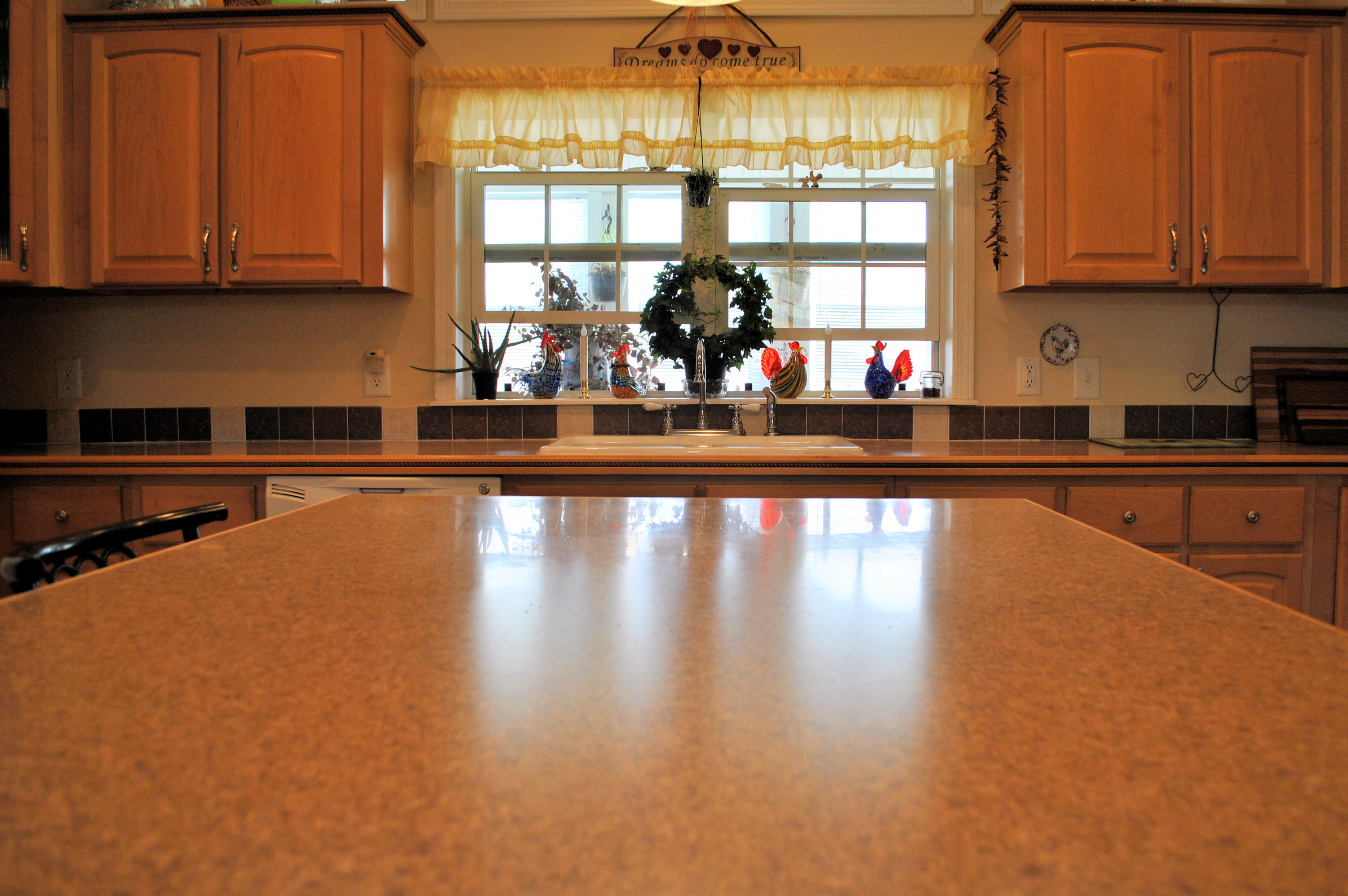 785 Union Valley Road Riner, VA 24149 - Photo 29 of 86 a kitchen with granite countertop a stove and cabinets