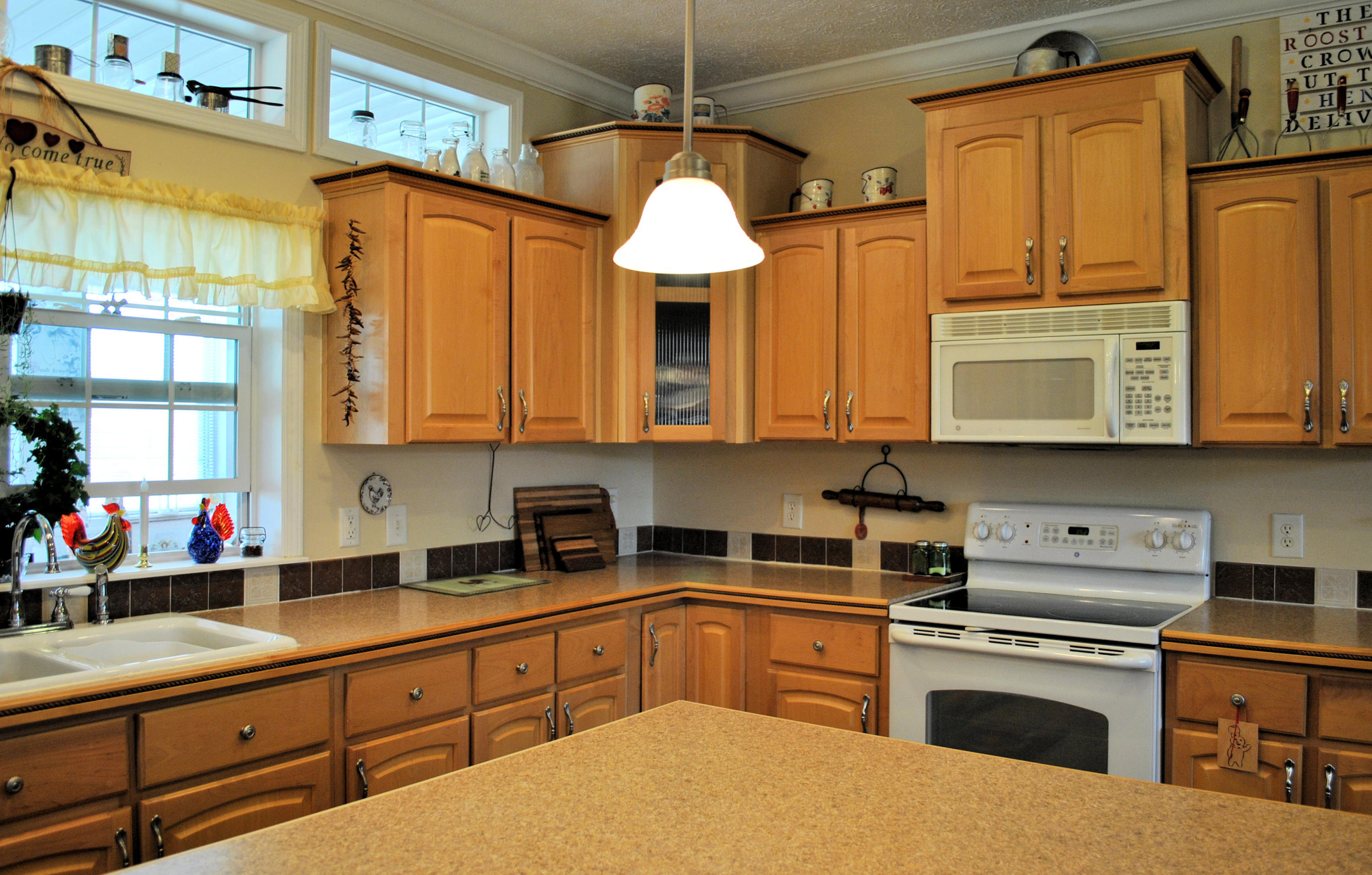 785 Union Valley Road Riner, VA 24149 - Photo 35 of 86 a kitchen with stainless steel appliances a stove sink and cabinets