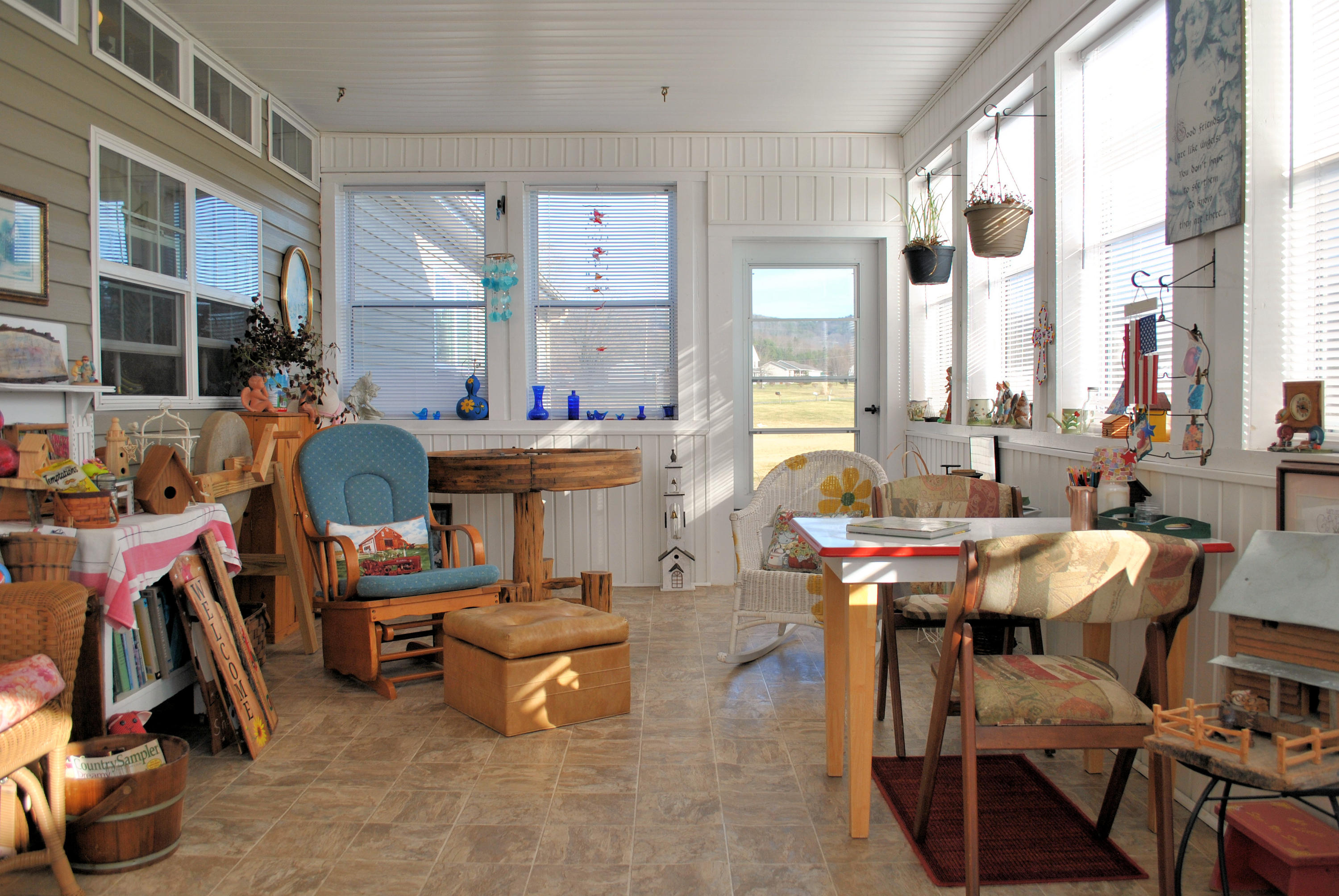785 Union Valley Road Riner, VA 24149 - Photo 55 of 86 a living room with furniture and a floor to ceiling window