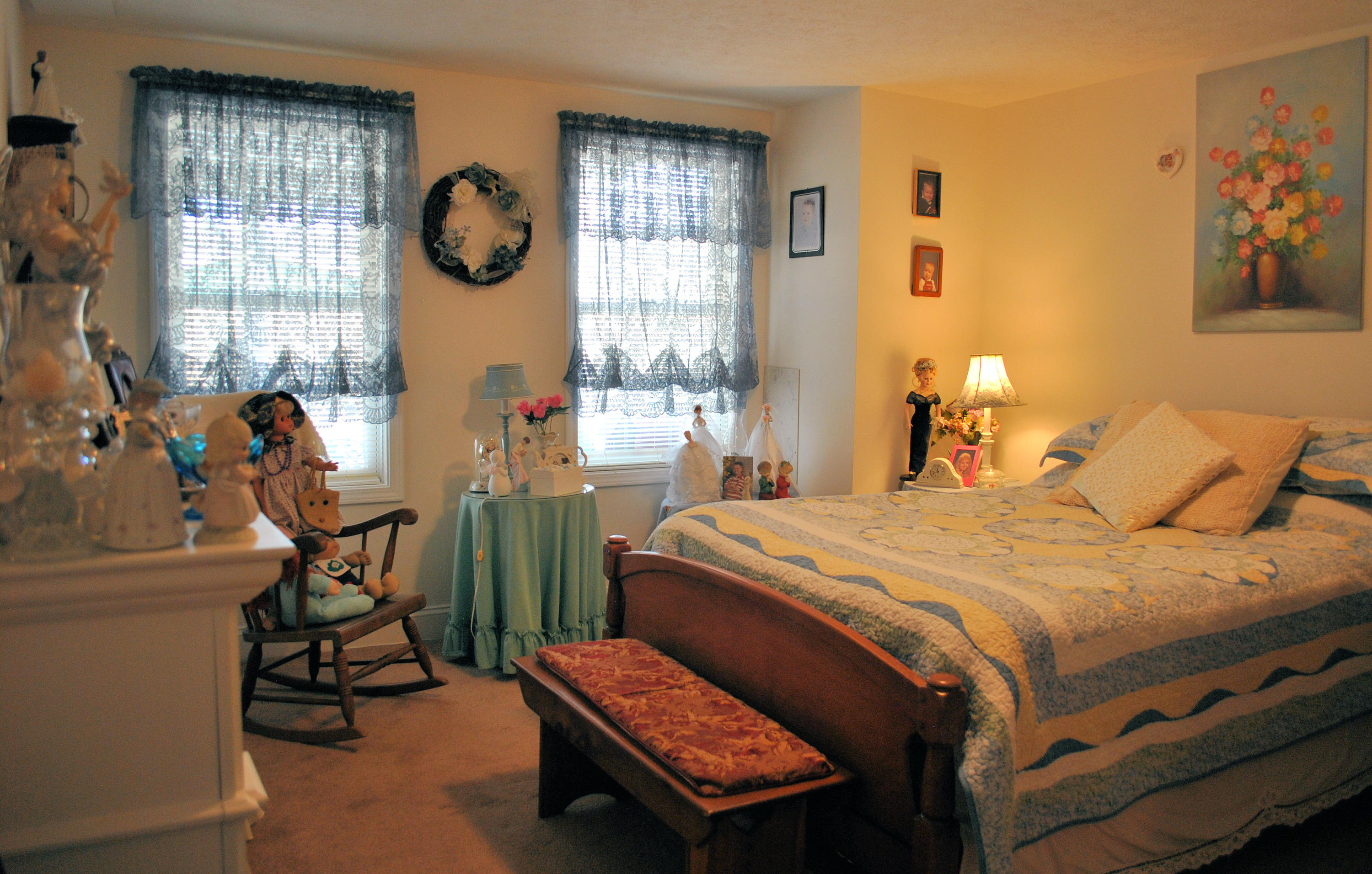 785 Union Valley Road Riner, VA 24149 - Photo 74 of 86 a bedroom with a bed and a chandelier