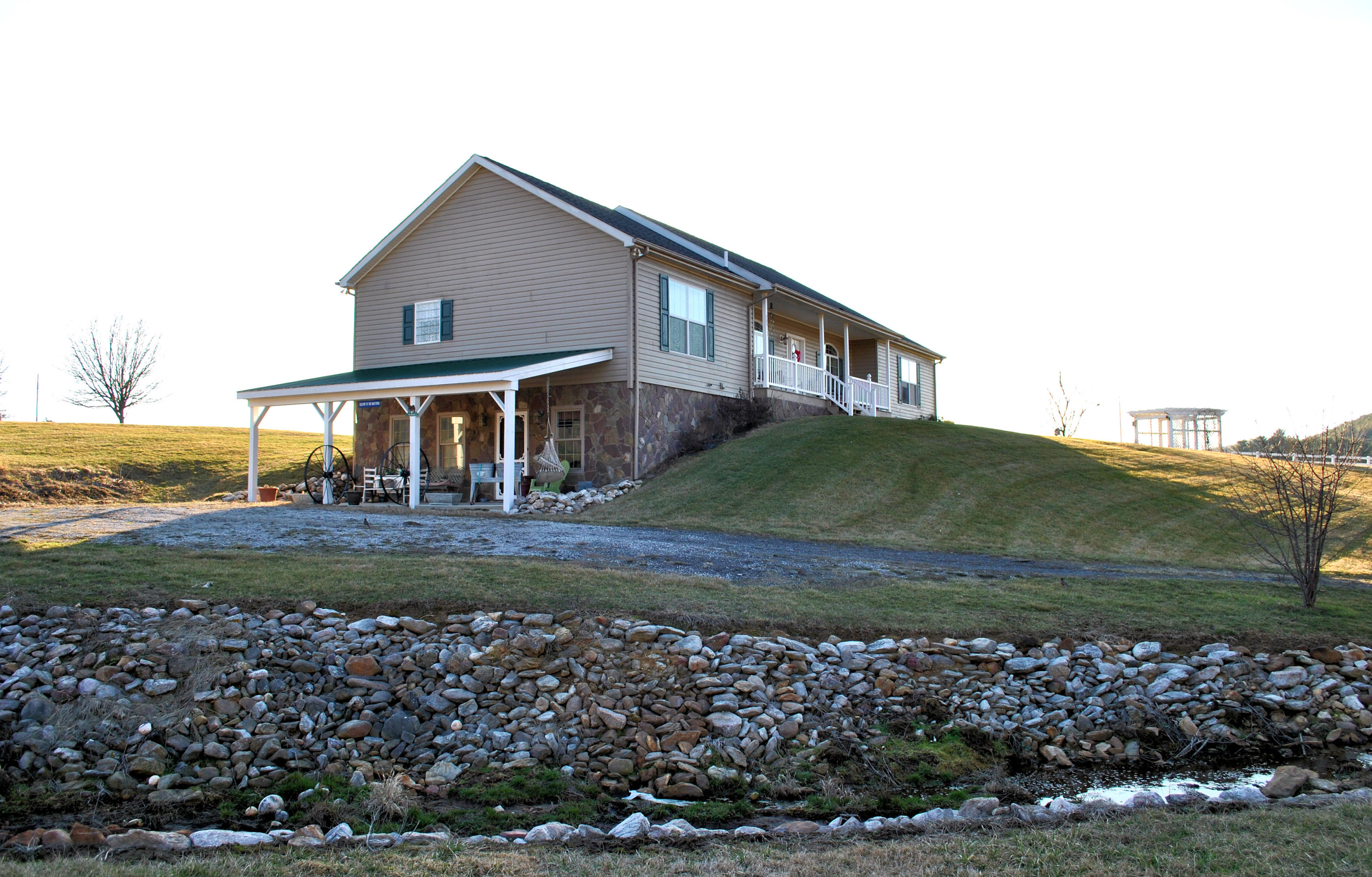 785 Union Valley Road Riner, VA 24149 - Photo 9 of 86 a front view of a house with a yard