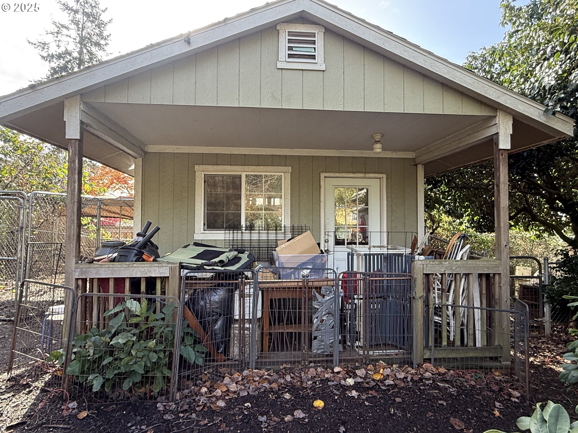 5908 Southwest 45th Avenue Portland, OR 97221 - Photo 4 of 4 a view of a house with backyard and sitting area