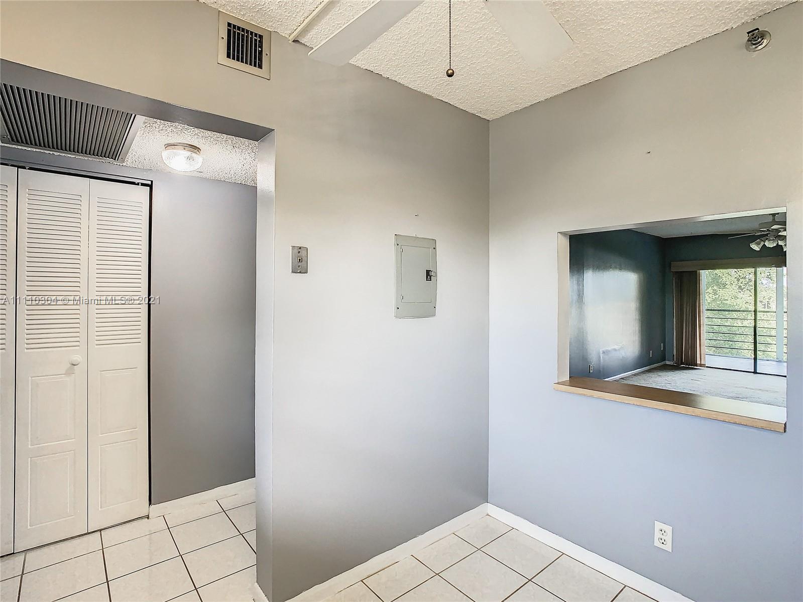 9235 Southwest 8th Street, Unit 401 Boca Raton, FL 33428 - Photo 19 of 40 a view of an empty room