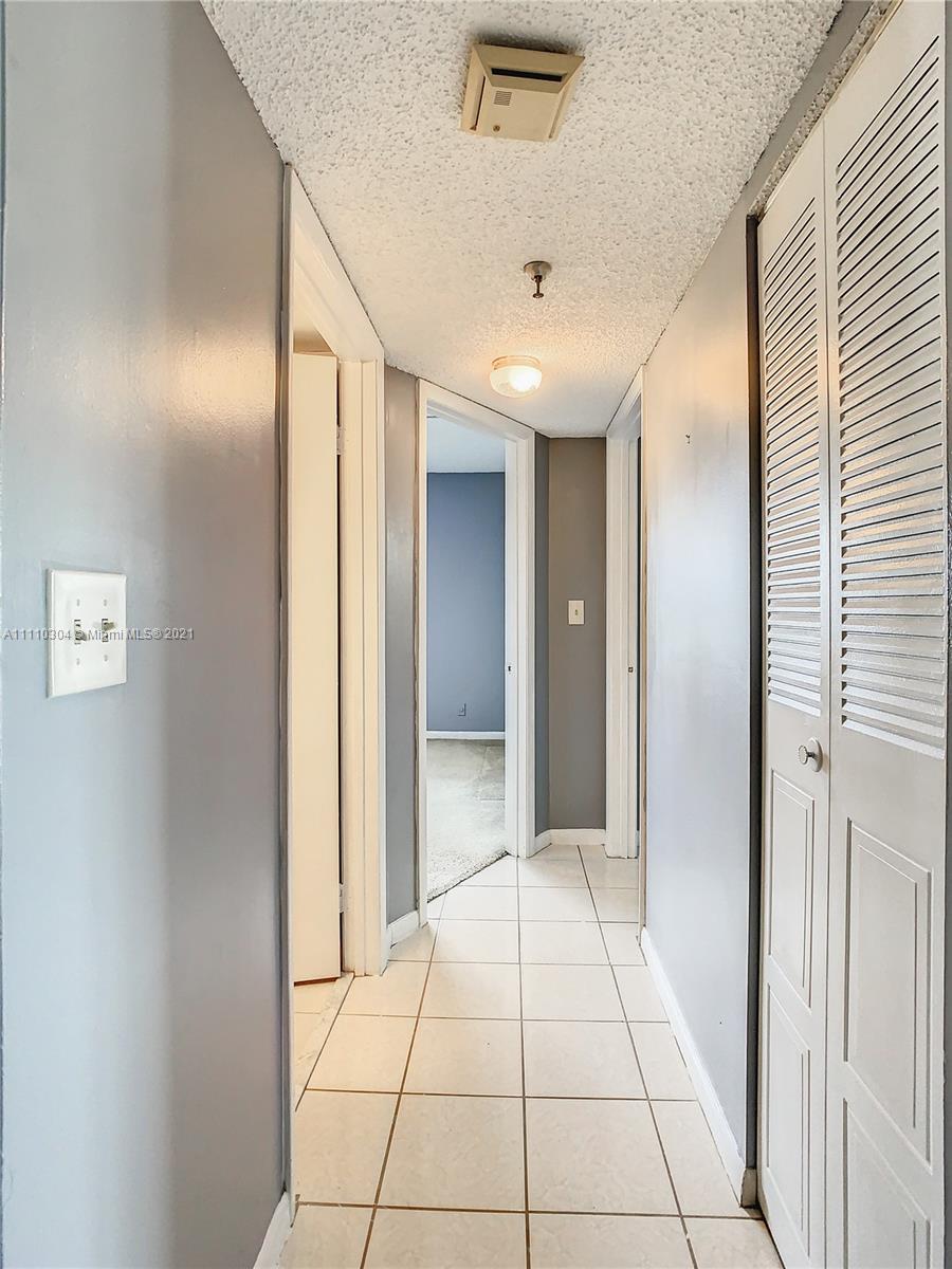 9235 Southwest 8th Street, Unit 401 Boca Raton, FL 33428 - Photo 20 of 40 a view of an entryway of a house