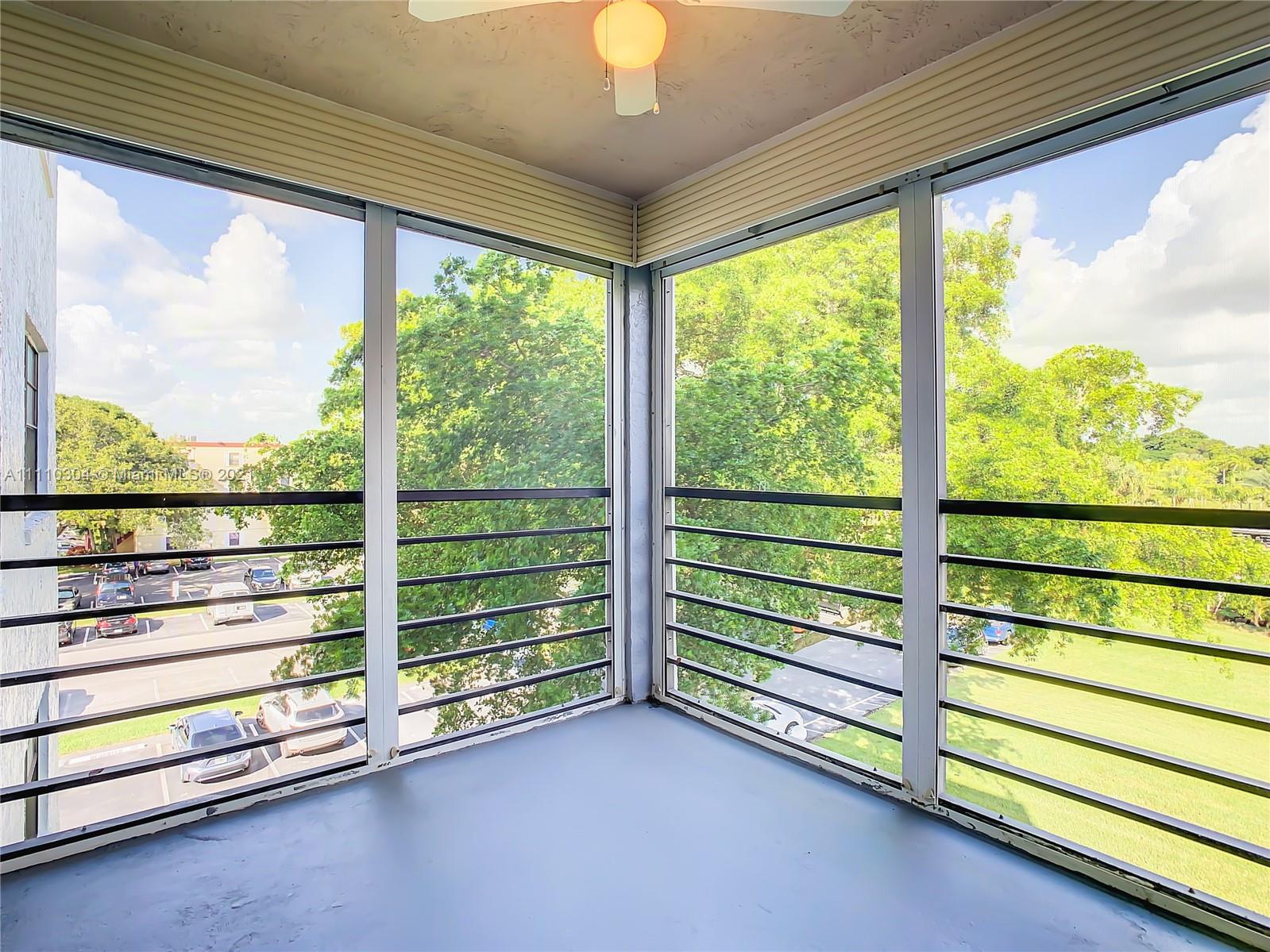 9235 Southwest 8th Street, Unit 401 Boca Raton, FL 33428 - Photo 39 of 40 a view of a room with stairs